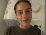 Busty tomboy gives a cockjob