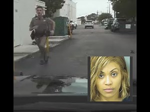 Drunk girl pulls down her pants to pee in front of cop & takes off when he's not looking (short)