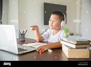 Young student distance learning virtual distance online class on video call virtual lesson, technology studying at home using laptop computer. Parent Stock Photo - Alamy
