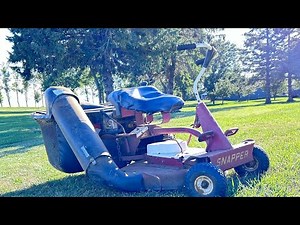 Putting on bagger on snapper mower!