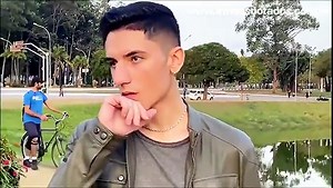 Two Young Guys Meet In The Park