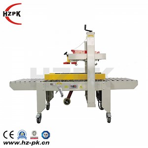 [Hot Item] Fxj-5050 Full Automatic Milk Carton Box Sealing Tape Machines