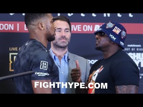 ANTHONY JOSHUA STARES DOWN DILLIAN WHYTE AT FIRST FACE OFF FOR REMATCH