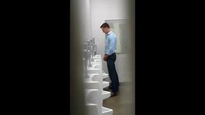 Hot guys caught peeing at the urinals