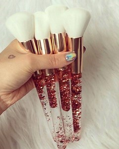 A waterfall of glitter ✨ . . . #Cosmicbrushes #theoriginalliquidglitterbrushes #glitterbrushes #handmade #indiebrand #liquidglitter #makeupbrushes #glamlife #powderbrush #makeup #goldbrushes #beauty #veganmakeup | Cosmic Brushes | Facebook