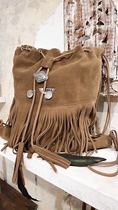 Wild backpack, our iconic fringe backpack is a must. #backpack #fringebackpack #suedebackpack #mochila | Layer Boots
