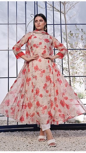 Ruby red amaryllis. Presenting “Ruby red amaryllis” – a spellbinding dress in a rich, enchanting Pink Floral Tone. The chiffon maxi is adorned with a meticulously lace neck, creating a dazzling design. Paired with crepe bottoms, the ensemble is completed with a Chiffon dupatta. “Ruby red amaryllis” is a masterpiece of elegance and sophistication. Frock Fabric: Chiffon. Dupatta Fabric: Chiffon. #Nazmina #Iwearnazmina #Eid #Summers | Nazmina