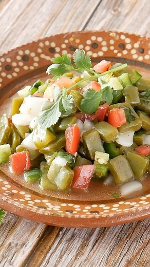 1.2K views · 18 reactions | Ensalada de Nopales  This cactus salad makes the perfect side dish. It’s quick to make and SO versatile. Pairs well with just about any Mexican dish!  Recipe @mamamaggieskitchen https://inmamamaggieskitchen.com/cactus-salad-with-queso-fresco-or-ensalada-de-nopales-con-queso-fresco/ #ensaladadenopales #cactussalad #mamamaggieskitchen #mexicanfood #mexicanrecipe | Mama Maggie's Kitchen | Facebook