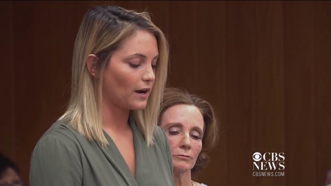 Victims' dad lunges at Larry Nassar in court