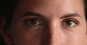 clip-1066958473-close-female-upper-face-part-brown-eyed-woman