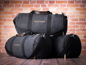 Meet your new favorite summer travel bag! Be sure to check out our personalized washed canvas duffle bags--- the perfect gift for all your #groomsmen | Joyful Tidings Bridal