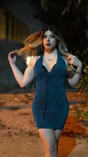 Crossdressing outdoors in mini dress