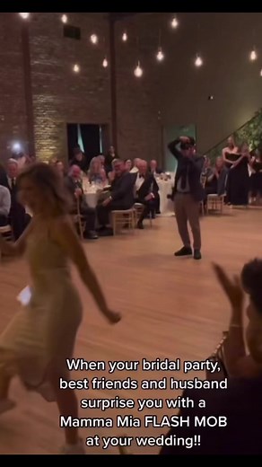 When your bridal party, best friends and husband surprise you with a Mamma Mia FLASH MOB at your wedding!!🤍. via @kisssygiirl. #foreverandalwaysweddings #wedding #weddingreception #surprise #flashmob #mammamia | Forever and Always Weddings
