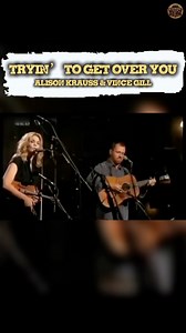 53K views · 1.7K reactions | TRYN’ TO GET OVER YOU - ALISON KRAUSS & VINCE GILL “Tryin’ to Get Over You” by Alison Krauss & Vince Gill is a soft, heartfelt duet about the slow process of moving on. Their tender harmonies and gentle melody capture the quiet ache of a love that’s hard to forget. It’s a simple, honest reminder that healing takes time. | Country Scope | Facebook