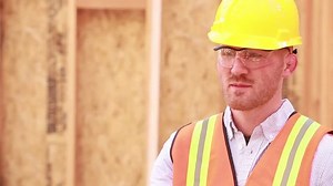 clip-15775609-construction-worker-putting-ear-plugs