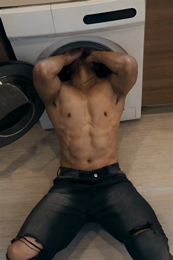 The home owner hired him to "fix" his washing machine. He was tricked to drink a drugged water when he arrived. He became weak and suddenly unable to move as he was checking out the machine. The home owner then goes to work on his helpless abs. #gutpunch #ai #hotmen #abs #muscle