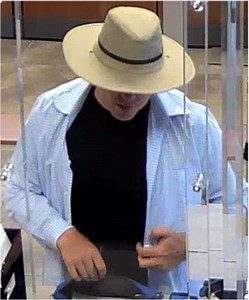 Bank Robber Impersonates Cop Threatens To Shoot Tellers' Coworker