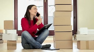 Woman Home Counting Packages Talking On Stock Footage Video (100% Royalty-free) 15413404 | Shutterstock