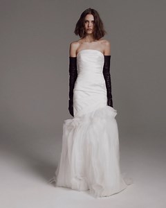 This fit & flare #VeraWangBride strapless wedding dress features a pleated mikado bodice with a dramatic ruffle skirt.🌷🌷🌷 https://bit.ly/3vKmvPS | Designer Bridal Room, Hong Kong