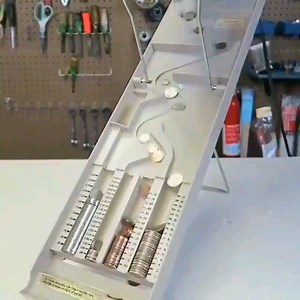 a vintage coin sorter