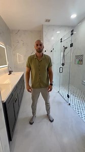 Step into luxury with our latest bathroom remodel! 🚿✨ Watch as we transform a standard space into a spa-like retreat featuring a sleek curbless shower, his and hers shower sets for personalized comfort, and an elegant LED mirror that adds a modern touch. Witness the incredible before-and-after journey as we unveil the stunning outcome of this transformation. Get inspired and elevate your home with SK Houston Constructions! 💫 #BathroomRemodel #LuxuryLiving #HomeRenovation | SK Houston Construct