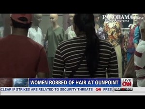 Women robbed of hair at gunpoint