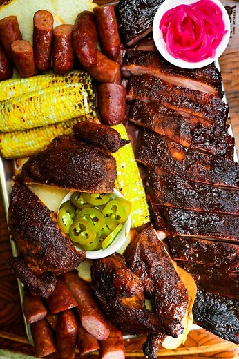 48K views · 2.2K reactions | Happy 4th of July! When you don’t know what to cook, cook it all. Pork spare ribs, whole spatchcocked chicken, hot sausages, beer brats, corn on the cob, pickled jalapeños and red onions....: @thekitchenwhitelaw...#TheKitchenWhitelaw #4thofjuly #bbqplatter #bbq #cookout #barbecue #spareribs #smokedsausage #offsetsmoker #bbqchicken #cornonthecob | The Kitchen Whitelaw | Facebook