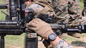 Skilled US Marines Fire M249 and M240B Machine Guns