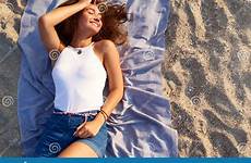 laying beach sun towel woman sand young pretty tanned attractive fashionable lies stylish warm female stock preview