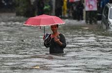 mumbai india rains weather extreme rainfall world rain heavy severe girl becoming bbc conditions drought july after getty country source