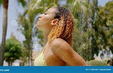 bikini shower taking outdoor girl preview