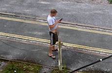 caught street peeing man phone sex his while camera wee using having hands gay fetish daily star