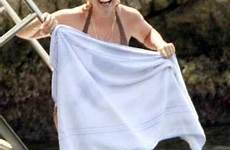 lily allen topless last girl 2008 french holiday stripping towel steps covers sea she before into off white