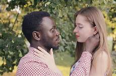 interracial couples hugging caucasian ethnic