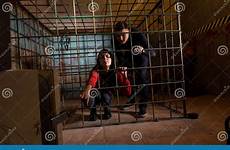 cage girl imprisoned halloween two hand metal pulling victims young her bars preview through