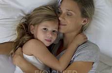 bed daughter mother embracing stock child dissolve