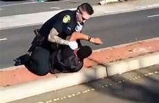 police cop down caught witnesses camera officer man take unarmed outrage suspect video california who punching threatening gun his tackles