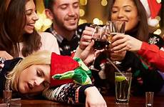 christmas passed party woman drunk holiday alcohol bar drinking drink during friends people drinks without season xmas use picking through
