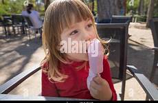 portrait ice lolly girl stock licking lips alamy eating enjoying child blonde three pink years old