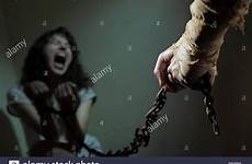 chained woman slave evil stock chain young prisoner alamy man tied