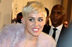 cyrus miley concert naked shows dancing nearly unveils her video upi