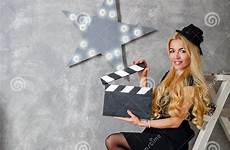director girl clapperboard film stock