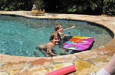pool door next neighbor neighbors kelly jumping splashing lot community re which there part