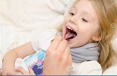 throat girl little examining tongue pediatrician
