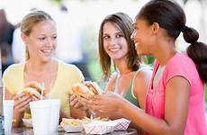 food eating girls fast teenage women teen outdoors sitting breast addicts defining minus vegetarian meat go teens her ladyclever stock
