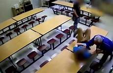 teacher student grabs cafeteria table