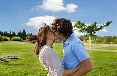 lovers teen kissing park dissolve stock royalty d943