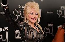 dolly parton leather her rock boobs dresses chick music outfit still divas turns bejewelled creation shows off night last topless