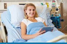 hospital bed patient teenage female relaxing stock smiling preview healthcare