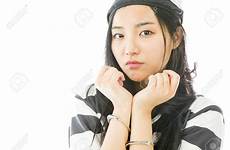 handcuffs asian girl young uniform woman stock her handcuffed prisoners sad wrists showing royalty